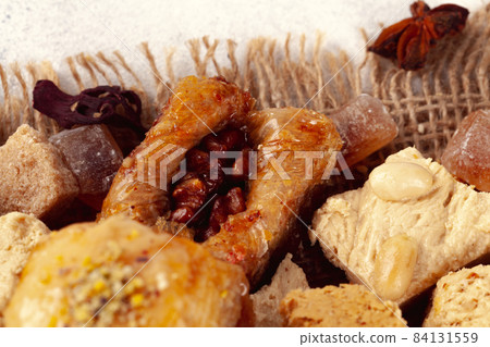 Assortment of turkish desserts baklava and halva Assortment of turkish desserts baklava and halva 84131559