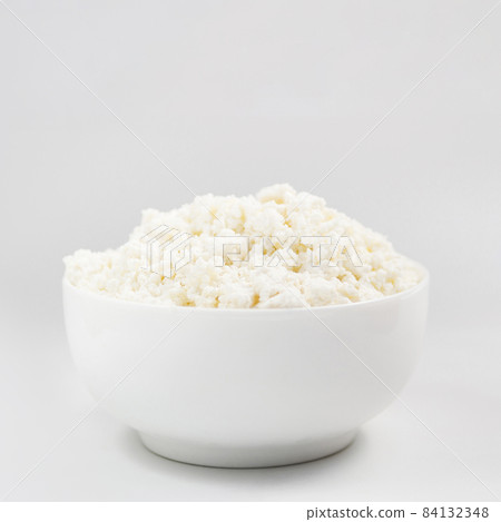 bowl full cottage cheese. High quality beautiful photo concept bowl full cottage cheese. High quality beautiful photo concept 84132348