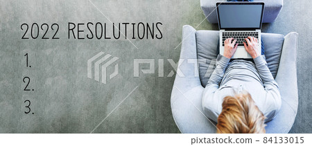2022 Resolutions with man using a laptop 2022 Resolutions with man using a laptop 84133015
