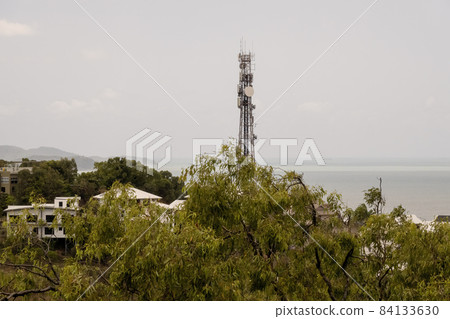 Suburban Communications Tower Behind Trees Suburban Communications Tower Behind Trees 84133630