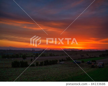 Asahi shining in the fields in Nishi-ku, Niigata Asahi shining in the fields in Nishi-ku, Niigata 84133686