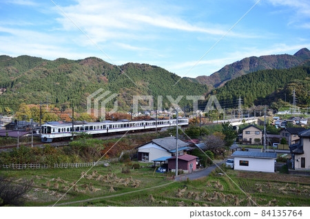 Seibu Railway 4000 series running through the Satoyama landscape of Chichibu 84135764
