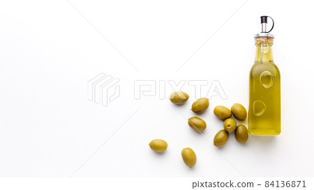 olive oil bottle with yellow olives copy space. High quality beautiful photo concept 84136871