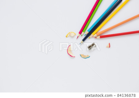 bright pencils near sharpener shaving. High quality beautiful photo concept bright pencils near sharpener shaving. High quality beautiful photo concept 84136878