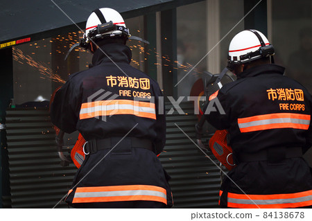 Fire drills for rescue activities using electric cutters by firefighters Fire drills for rescue activities using electric cutters by firefighters 84138678
