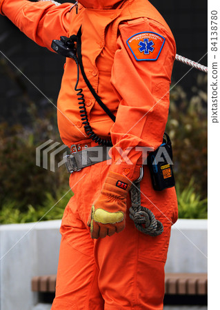 Rescue workers orange activity clothes 84138780