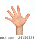 Child hand shows the number five 84139323