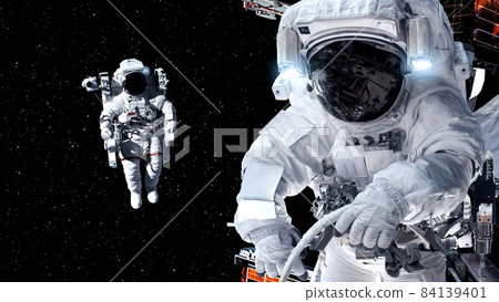 Astronaut spaceman do spacewalk while working for spaceflight mission 84139401
