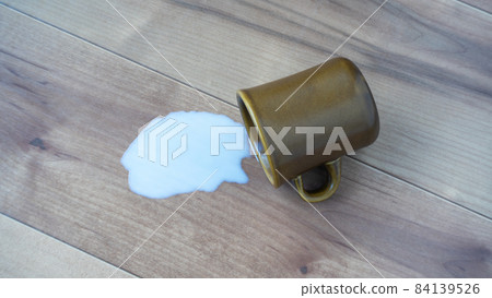 Spill milk on the floor / flooring 84139526