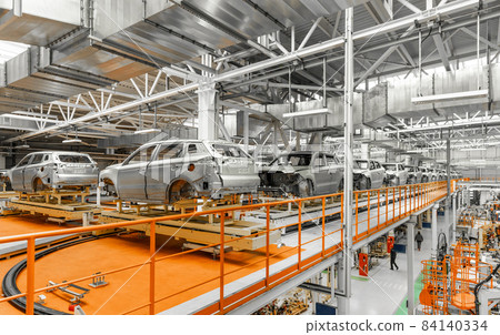 Automobile production line. Welding car body. Modern car assembly plant 84140334