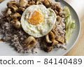 Khao Pad Ka Prao Pla Muek Kai Dao, thai food style 84140489