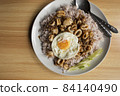 Khao Pad Ka Prao Pla Muek Kai Dao, thai food style 84140490