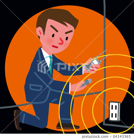 A man looking for eavesdropping radio waves with a detector 84143365