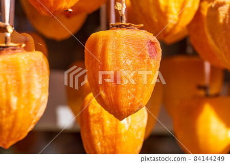 Autumn tradition, dried persimmon scenery 84144249