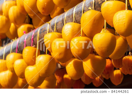 Autumn tradition, dried persimmon scenery 84144261