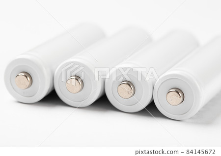 AA size alkaline batteries on a white background. Several batteries in a row. AA size alkaline batteries on a white background. Several batteries in a row. 84145672