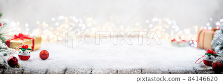Christmas decorations on snow Christmas decorations on snow 84146620