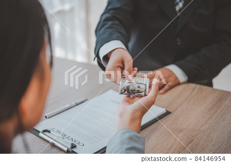 businessman was negotiating a bribery arrangement in which the dollar would be accepted as a bribe. Concepts of anti-bribery and anti-corruption. 84146954