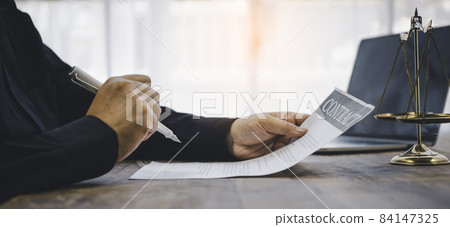 Law theme, mallet of the judge, law enforcement officers, evidence-based cases, and documents taken into account. Law theme, mallet of the judge, law enforcement officers, evidence-based cases, and documents taken into account. 84147325
