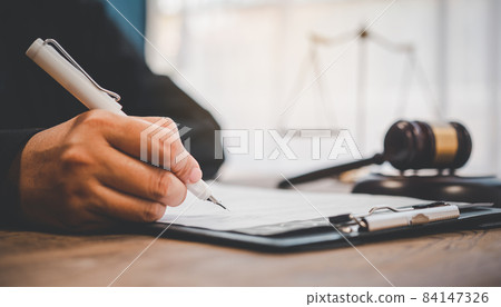 Law theme, mallet of the judge, law enforcement officers, evidence-based cases, and documents taken into account. Law theme, mallet of the judge, law enforcement officers, evidence-based cases, and documents taken into account. 84147326