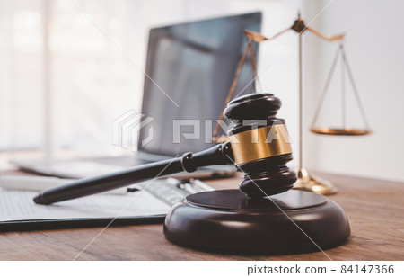 Law theme, mallet of the judge, law enforcement officers, evidence-based cases and documents taken into account... 84147366