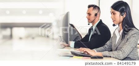 Business people wearing headset working in office broaden view 84149179