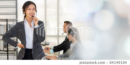 Business people wearing headset working in office broaden view 84149184