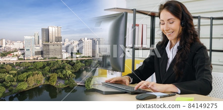 Business people wearing headset working in office broaden view Business people wearing headset working in office broaden view 84149275