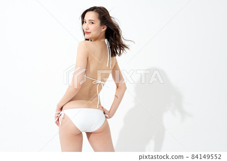 Portrait of a woman in a swimsuit 84149552