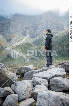 Hiking man travel outdoor lifestyle. 84150146