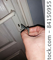unlocking the door 84150955