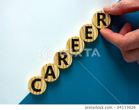 Wood circles with word 'career' stacking as step stair on paper blue and white background, copy space. Business concept success process. Wood circles with word 'career' stacking as step stair on paper blue and white background, copy space. Business concept success process. 84153626