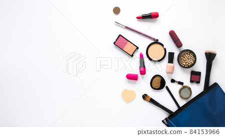 beauty bag with different cosmetics white table. High quality beautiful photo concept 84153966