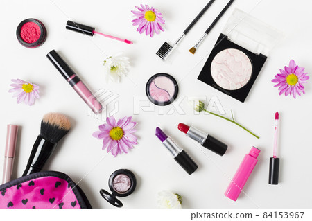 collage feminine colourful cosmetics white desk. High quality beautiful photo concept 84153967