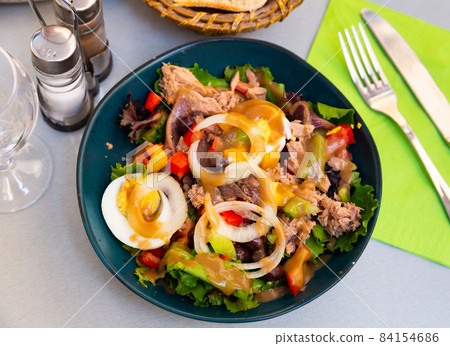 Traditional dish of French cuisine is the Nicoise salad Traditional dish of French cuisine is the Nicoise salad 84154686