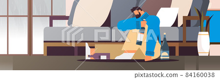 sad man drinker with bottles alcoholic drinking alone depressed addicted drunk guy having problem alcohol addiction sad man drinker with bottles alcoholic drinking alone depressed addicted drunk guy having problem alcohol addiction 84160038