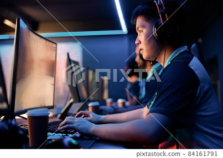 Cybersport team participating in online tournament in computer club Cybersport team participating in online tournament in computer club 84161791