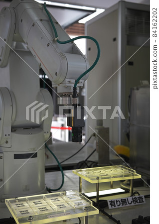 Image inspection with an arm robot Image inspection with an arm robot 84162202