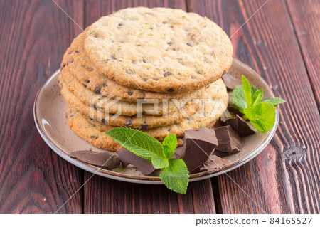 Oat cookies served on wooden table close up Oat cookies served on wooden table close up 84165527