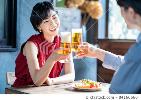 Couple having a lunch date Couple having a lunch date 84166660