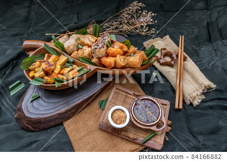 Fried taro rolls and Deep fried spring rolls, Fried tofu, Fried radish, Fried taro and black beans. Fried taro rolls and Deep fried spring rolls, Fried tofu, Fried radish, Fried taro and black beans. 84166882