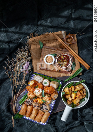 Fried taro rolls and Deep fried spring rolls, Fried tofu, Fried radish, Fried taro and black beans. Fried taro rolls and Deep fried spring rolls, Fried tofu, Fried radish, Fried taro and black beans. 84166904