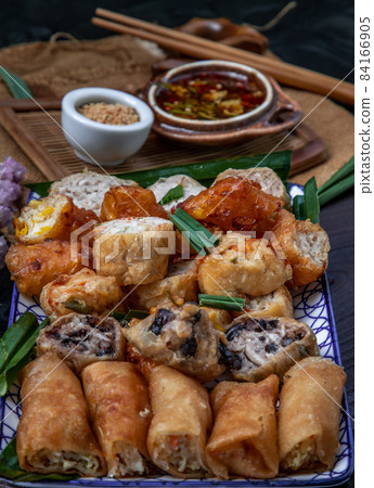 Fried taro rolls and Deep fried spring rolls, Fried tofu, Fried radish, Fried taro and black beans. Fried taro rolls and Deep fried spring rolls, Fried tofu, Fried radish, Fried taro and black beans. 84166905