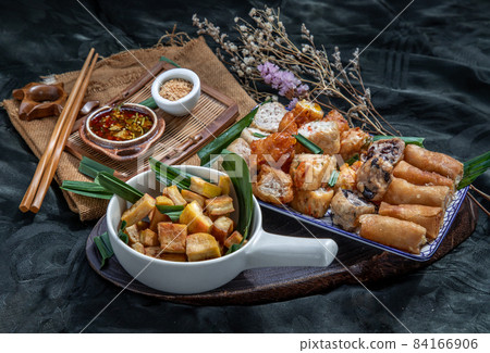 Fried taro rolls and Deep fried spring rolls, Fried tofu, Fried radish, Fried taro and black beans. Fried taro rolls and Deep fried spring rolls, Fried tofu, Fried radish, Fried taro and black beans. 84166906