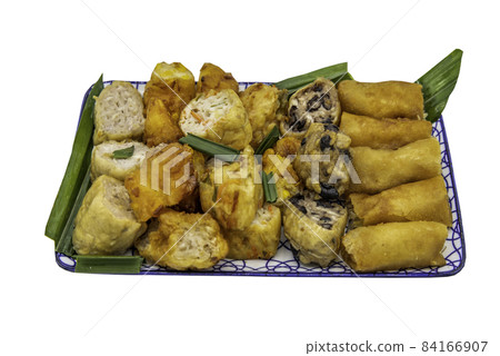 Fried taro rolls (Taro Guangjian) and Deep fried spring rolls, Fried tofu, Fried radish, Fried taro and black beans (Zhu jiao quan or Fried taro cakes) isolated on white background with clipping path. Fried taro rolls (Taro Guangjian) and Deep fried spring rolls, Fried tofu, Fried radish, Fried taro and black beans (Zhu jiao quan or Fried taro cakes) isolated on white background with clipping path. 84166907