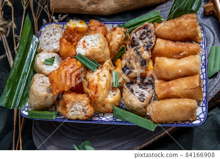 Fried taro rolls and Deep fried spring rolls, Fried tofu, Fried radish, Fried taro and black beans. Fried taro rolls and Deep fried spring rolls, Fried tofu, Fried radish, Fried taro and black beans. 84166908