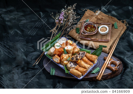 Fried taro rolls and Deep fried spring rolls, Fried tofu, Fried radish, Fried taro and black beans. Fried taro rolls and Deep fried spring rolls, Fried tofu, Fried radish, Fried taro and black beans. 84166909
