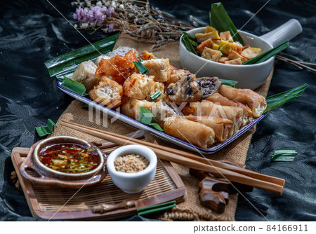 Fried taro rolls and Deep fried spring rolls, Fried tofu, Fried radish, Fried taro and black beans. Fried taro rolls and Deep fried spring rolls, Fried tofu, Fried radish, Fried taro and black beans. 84166911