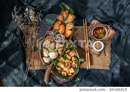 Fried taro rolls and Deep fried spring rolls, Fried tofu, Fried radish, Fried taro and black beans. Fried taro rolls and Deep fried spring rolls, Fried tofu, Fried radish, Fried taro and black beans. 84166929