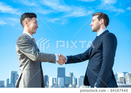 Businessmen shaking hands Businessmen shaking hands 84167448
